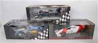 Lot 2541 - Three various boxed Minichamps 1/18 scale F1...