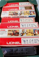 Lot 373 - 7 assorted Lionel plastic bogie hopper wagons...
