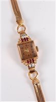 Lot 2553 - A lady's '14k' cocktail watch, the square dial...