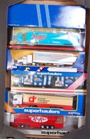 Lot 2628 - 12 various boxed Corgi Super Haulers and other...