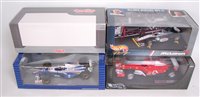 Lot 2647 - Four various boxed 1/18 scale F1 diecasts to...