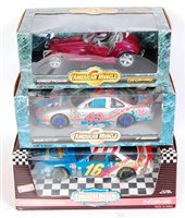 Lot 2652 - Three boxed Ertl boxed collectables 1/18 scale...