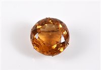 Lot 2598 - A 9ct citrine brooch, the round faceted...
