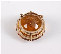 Lot 2598 - A 9ct citrine brooch, the round faceted...