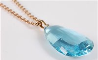 Lot 2530 - An aquamarine pendant and 9ct chain, the large...