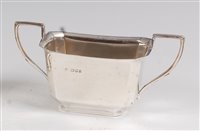 Lot 118 - An Art Deco silver twin handled sugar bowl,...