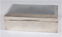 Lot 121 - An Art Deco silver table cigarette box, the...