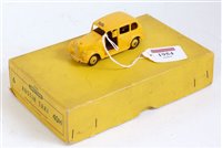 Lot 2002 - A Dinky Toys trade box No. 40H Austin taxi,...
