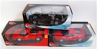 Lot 2719 - Three boxed Hotwheels modern release 1/18...