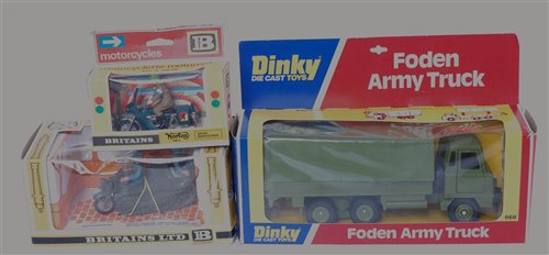 Lot 1290 - A Dinky Toys and Britains boxed military...