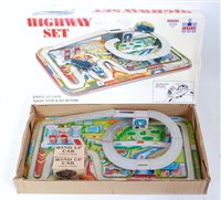 Lot 3229 - A Welby reproduction tinplate highway set,...