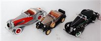 Lot 2760 - Three various boxed 1/24 scale Franklin Mint...
