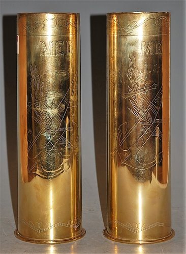 Lot 31 - A pair of trench art brass shell cases, having...