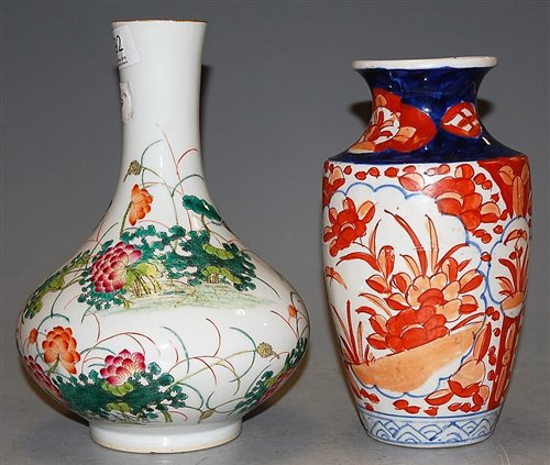 Lot 37 - A Chinese bottle vase enamel decorated with...