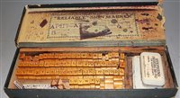 Lot 112 - A boxed 'Reliable' sign-marker printing kit