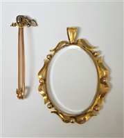 Lot 326 - An early 20th century 9ct seed pearl horseshoe...