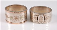Lot 329 - A Victorian silver bangle, with engraved ivy...