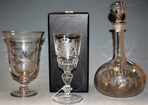 Lot 53 - A cut glass pedestal goblet etched with the...