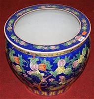 Lot 131 - A Chinese jardiniere, on a blue ground...