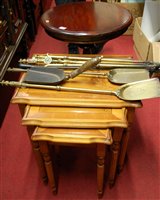 Lot 1074 - Brass fire irons, nest of occasional tables,...