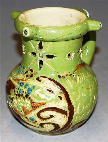 Lot 189 - A Devonware art pottery mottoware puzzle jug,...