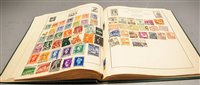 Lot 265 - A stamp album and a quantity of loose stamps,...
