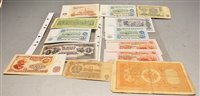 Lot 266 - A box of worldwide assorted coins and banknotes