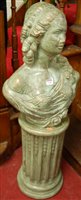 Lot 1100 - A classical style green and gilt patinated...