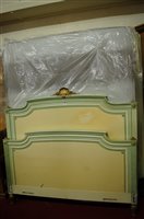 Lot 1106 - A neo-classical style painted and gilt...