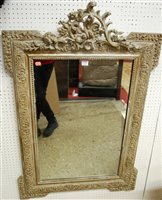 Lot 1117 - An early 20th century limed and gilt decorated...