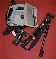 Lot 411 - A Nikon *F4* digital camera in soft carry case...