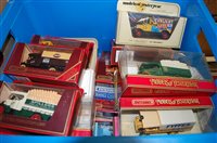 Lot 412 - A single box of various cased diecast vehicles...