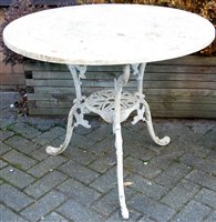 Lot 1125 - A painted and pierced metal circular garden...