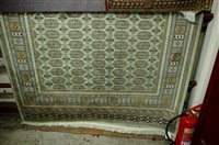 Lot 1139 - A contemporary green ground Bokhara rug, 230 x...