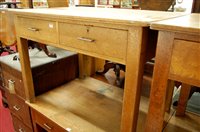 Lot 1164 - An early 20th century light oak two drawer...