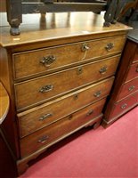 Lot 1183 - An early 19th century provincial oak chest of...