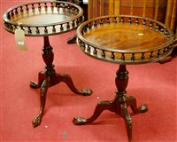 Lot 1184 - A pair of reproduction mahogany circular...