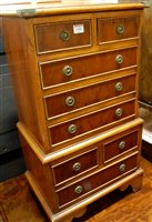 Lot 1186 - A small reproduction yew wood and crossbanded...