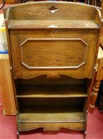 Lot 1199 - An early 20th century oak students bureau,...