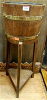 Lot 1204 - An early 20th century coopered oak circular...