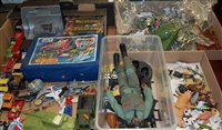 Lot 437 - Two boxes of mixed toys to include loose...