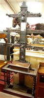 Lot 1208 - A circa 1900 heavily carved oak hall stand,...