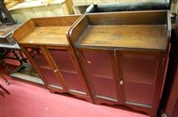 Lot 1210 - A pair of 1930s oak double door glazed low...