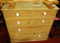 Lot 1219 - A Victorian pine round cornered chest of two...