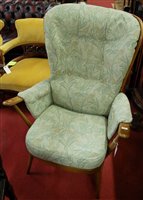 Lot 1277 - A contemporary Ercol mid elm stickback...