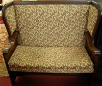 Lot 1289 - An oak floral upholstered and further studded...