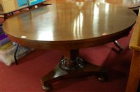 Lot 1251 - A 19th century plum-pudding mahogany circular...