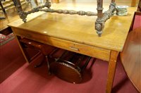 Lot 1254 - An early 20th century light oak two drawer...