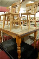 Lot 1263 - A modern pine farmhouse kitchen table, raised...