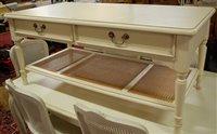 Lot 1265 - A contemporary cream painted round cornered...